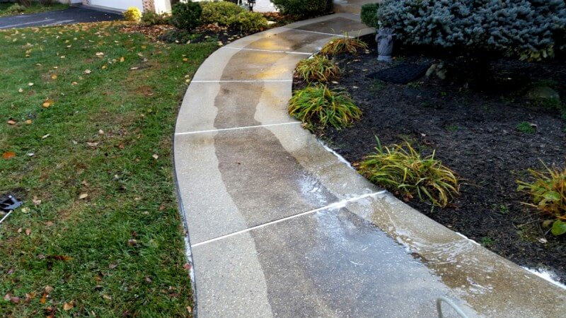Curved concrete walkway being cleaned in Millersville, MD