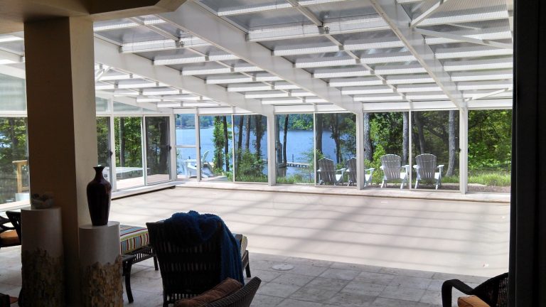Clean glass walls on a waterfront sunroom